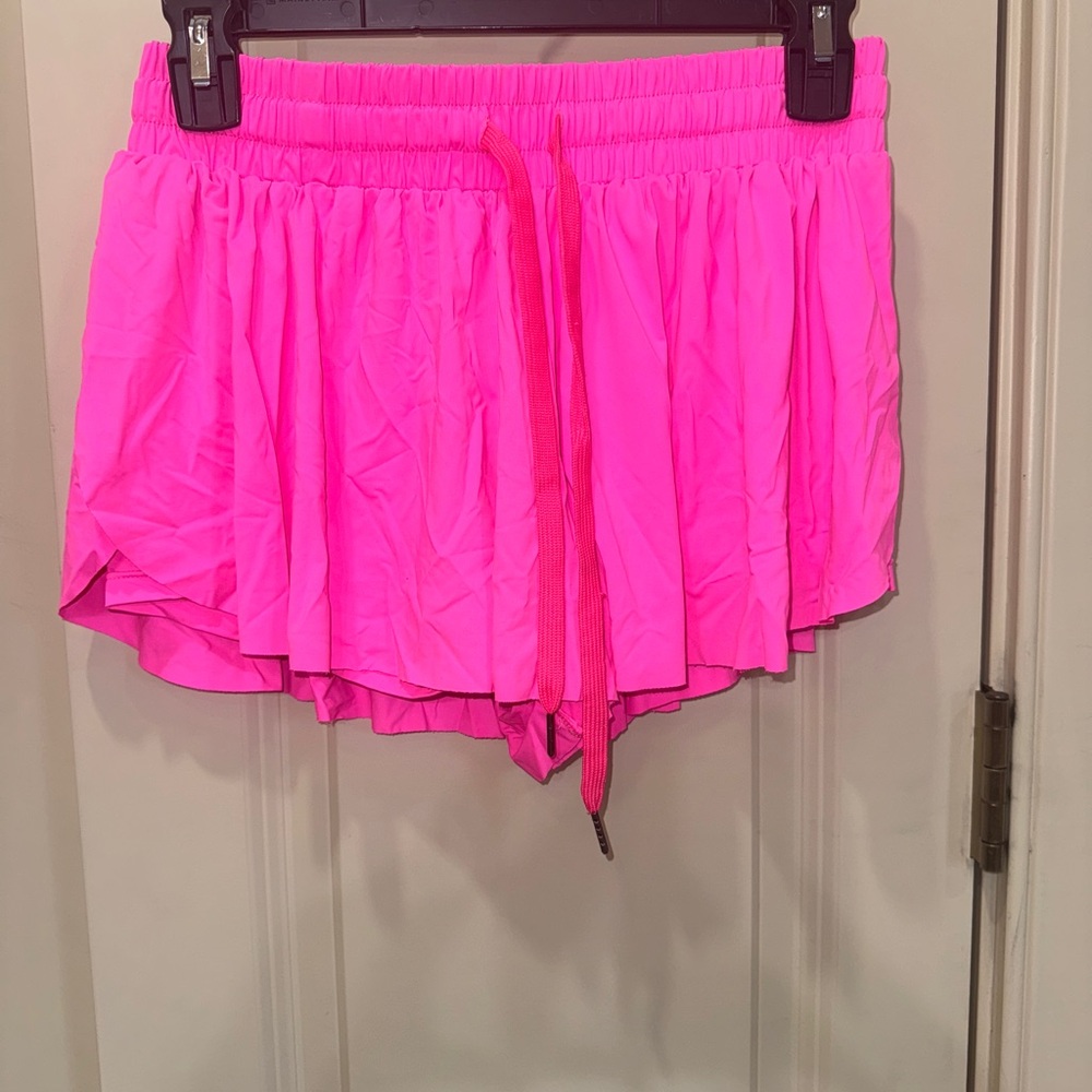 Pink Athletic Shorts with Elastic Waistband and Flowy Design